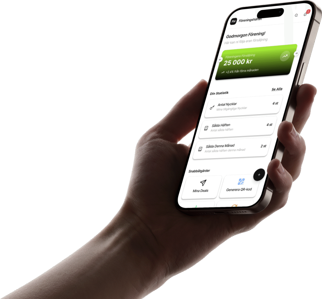 Hand som håller mobil med Föreningshäftets dashboard och föreningens försäljningsstatistik.